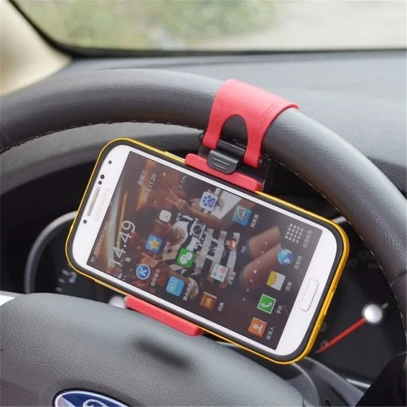 Black steering wheel phone clip mount holding smartphone for car navigation