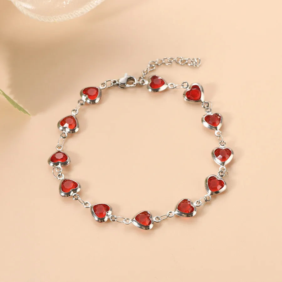Devil's Eye geometric heart bracelet in stainless steel showing six colour options on white background