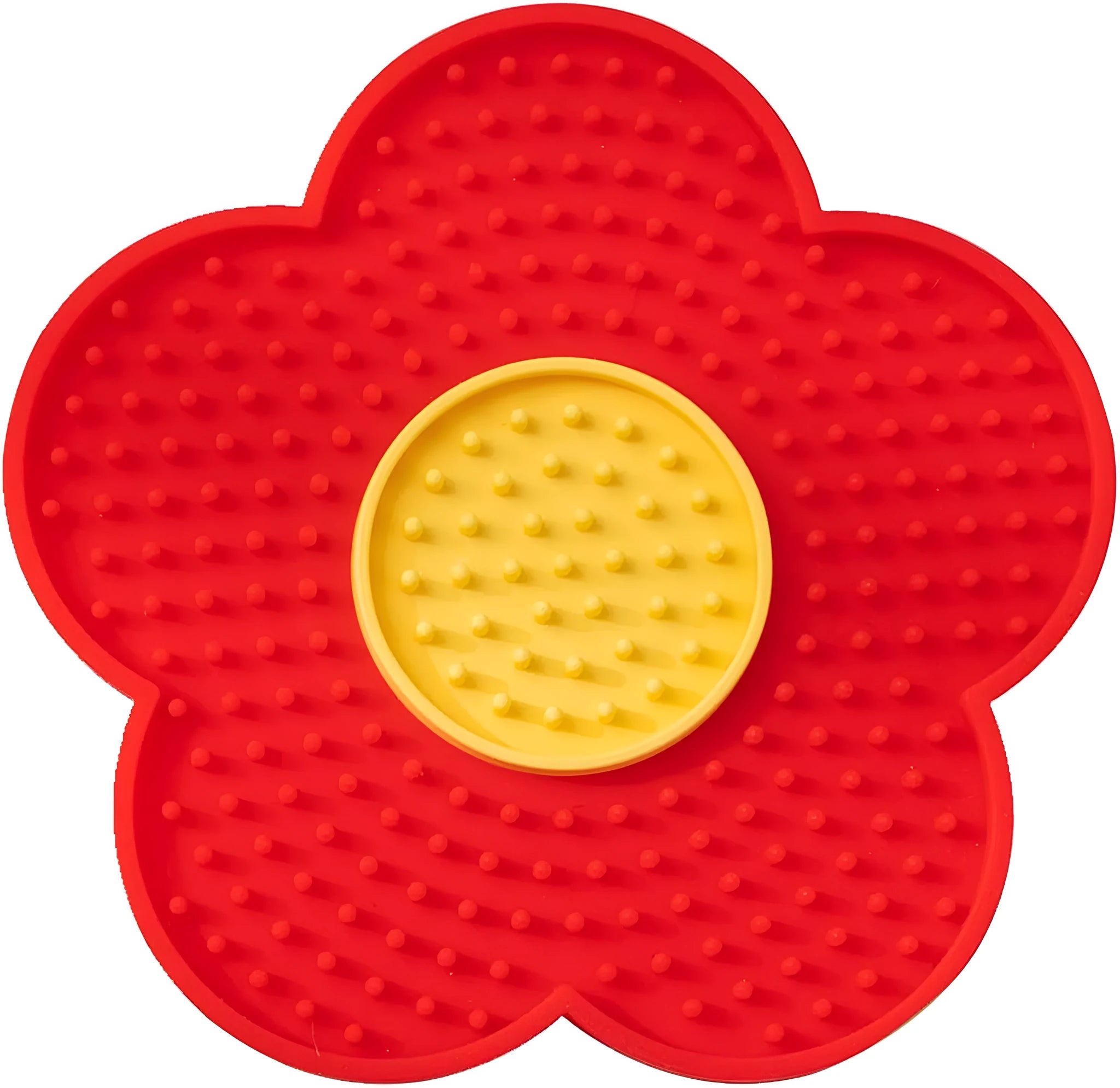 Flower-shaped blue silicone dog licking mat with suction cups on a smooth tile surface.