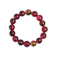 Handmade watermelon crystal bracelet with pastoral design elements on female wrist