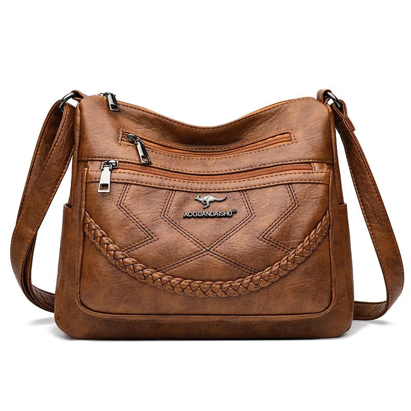 Soft PU leather crossbody shoulder bag in horizontal square shape with crossbody strap