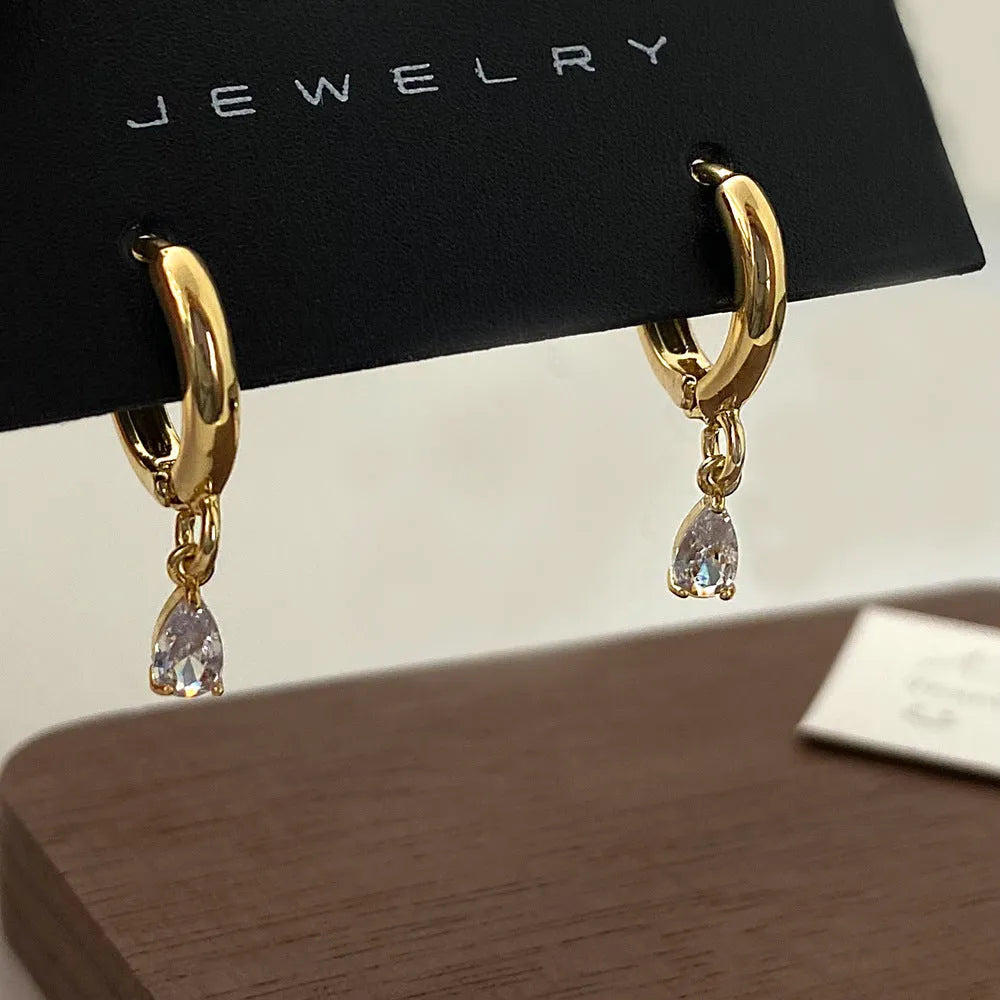 Women's zircon jewellery set with geometric necklace, earrings and anklet in meteor shower design