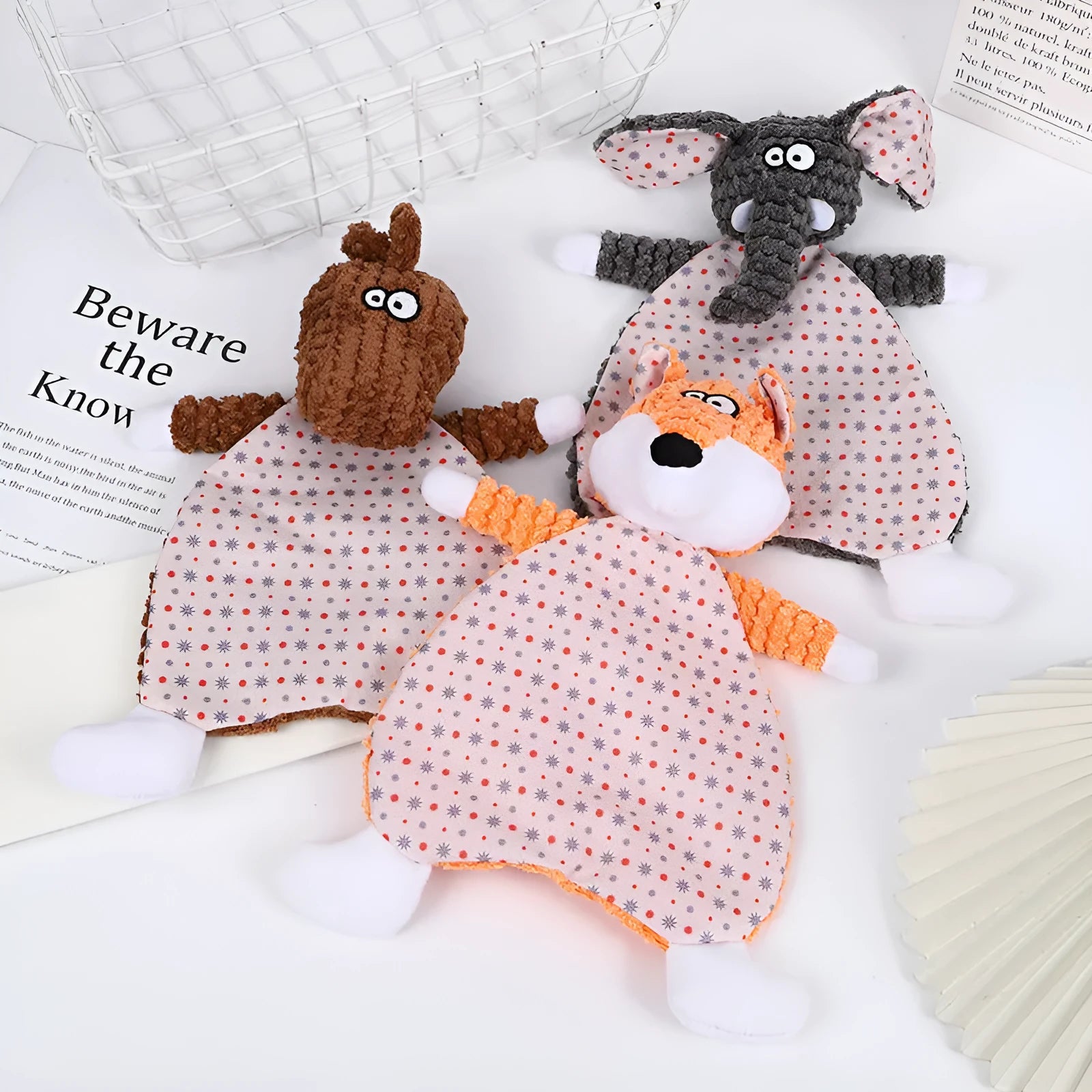 Brown plush velvet fox dog toy with sound paper core, shown next to grey elephant and orange cat versions.