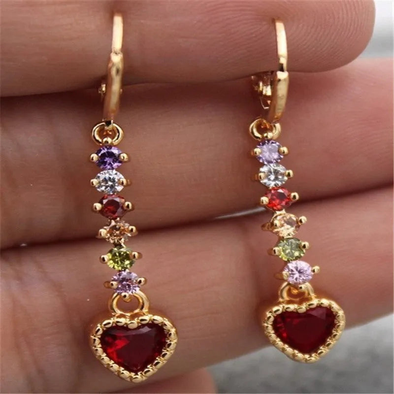 Women's heart-shaped alloy earrings with a shiny electroplated finish in gold and silver colours.