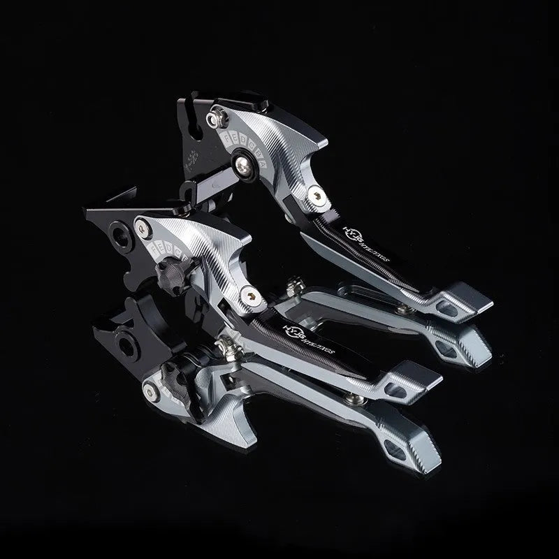 Pair of anodised metal motorcycle horn handle clutch levers with six-speed adjustable length, shown in a selection of colour finishes