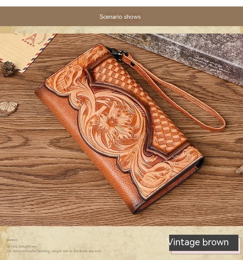Women's brown genuine leather tri-fold wallet with embossed floral pattern showing open compartments