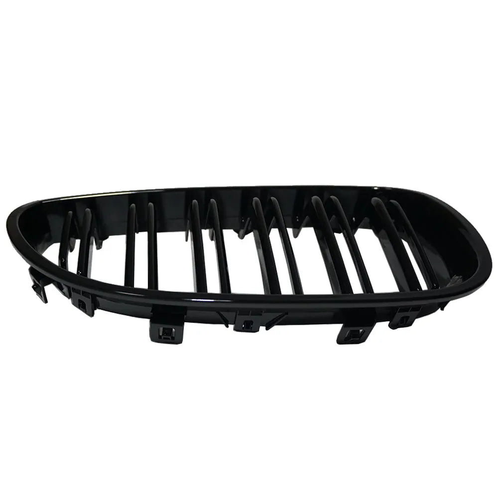 Carbon fibre pattern front grille for BMW 5-Series E60 E66 models on black background.