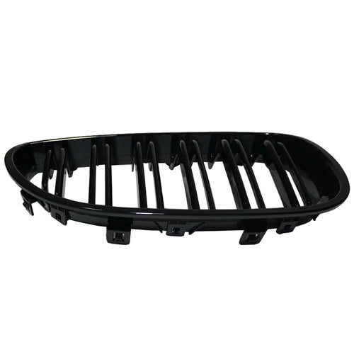 Carbon fibre pattern front grille for BMW 5-Series E60 E66 models on black background.