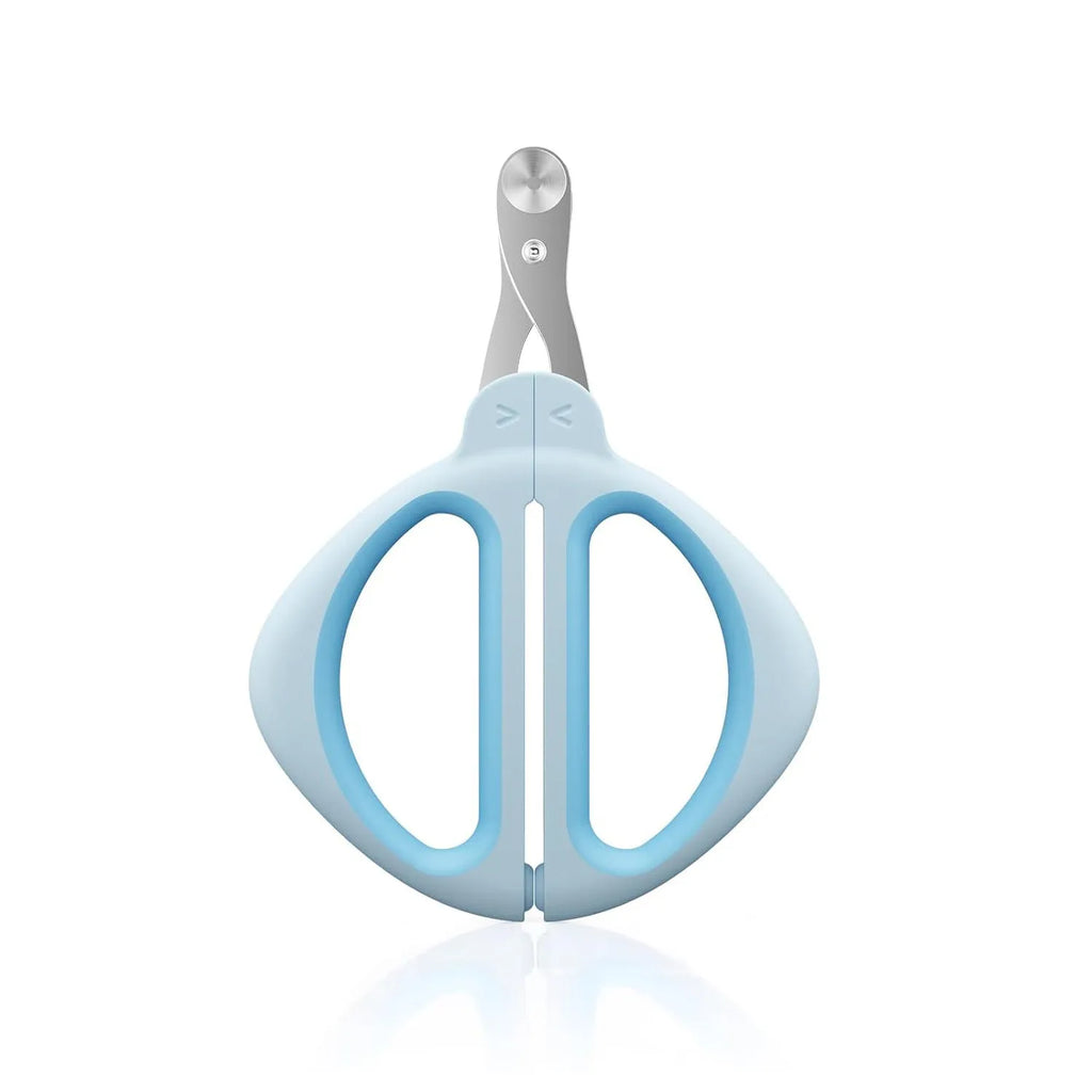Blue pet nail clipper with a round positioning hole and textured handle on a white background.