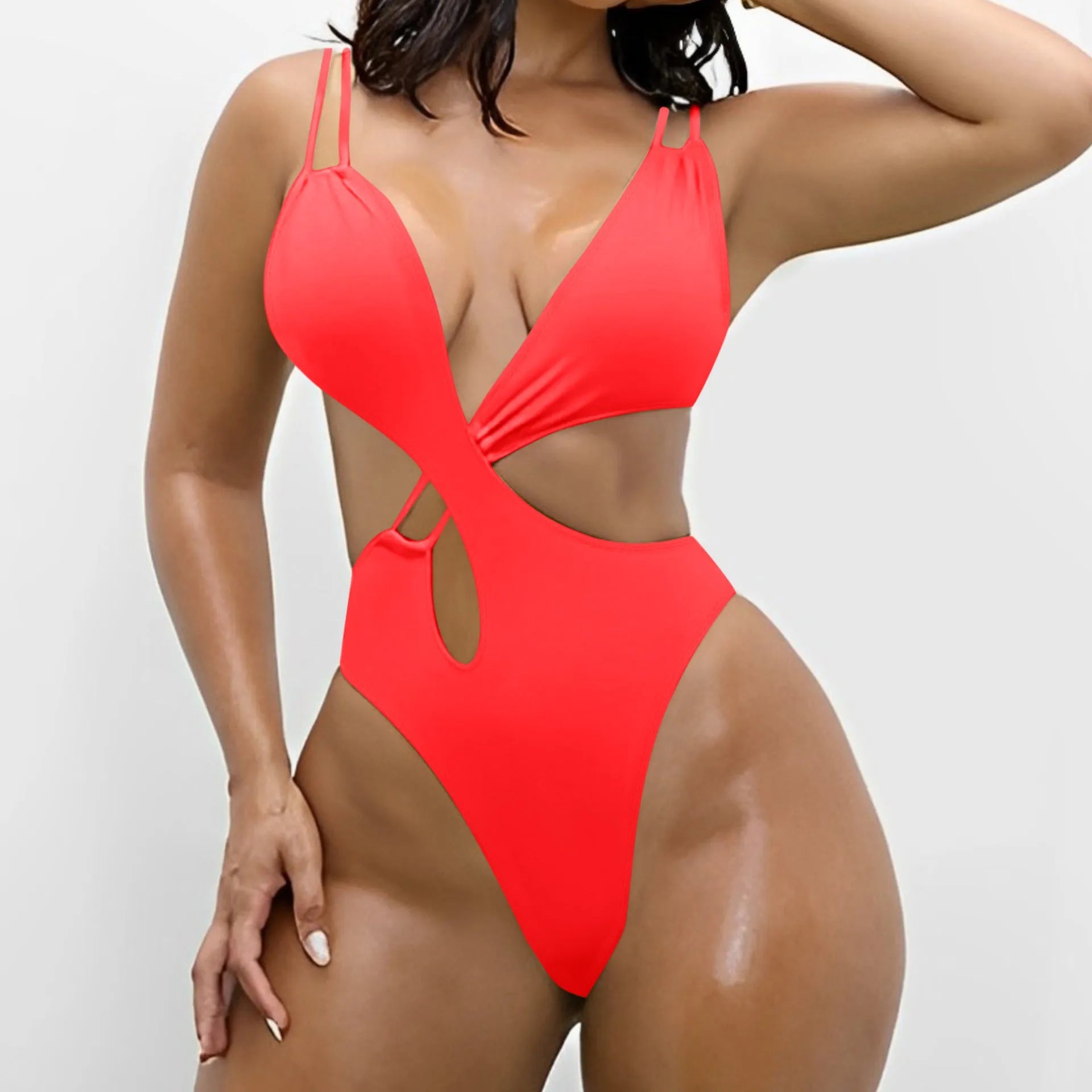 Women's backless one-piece swimsuit in nylon fabric showing solid colour options