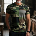 Man wearing a loose-fit short sleeve T-shirt with a raised 3D creative pattern in an art retro style.
