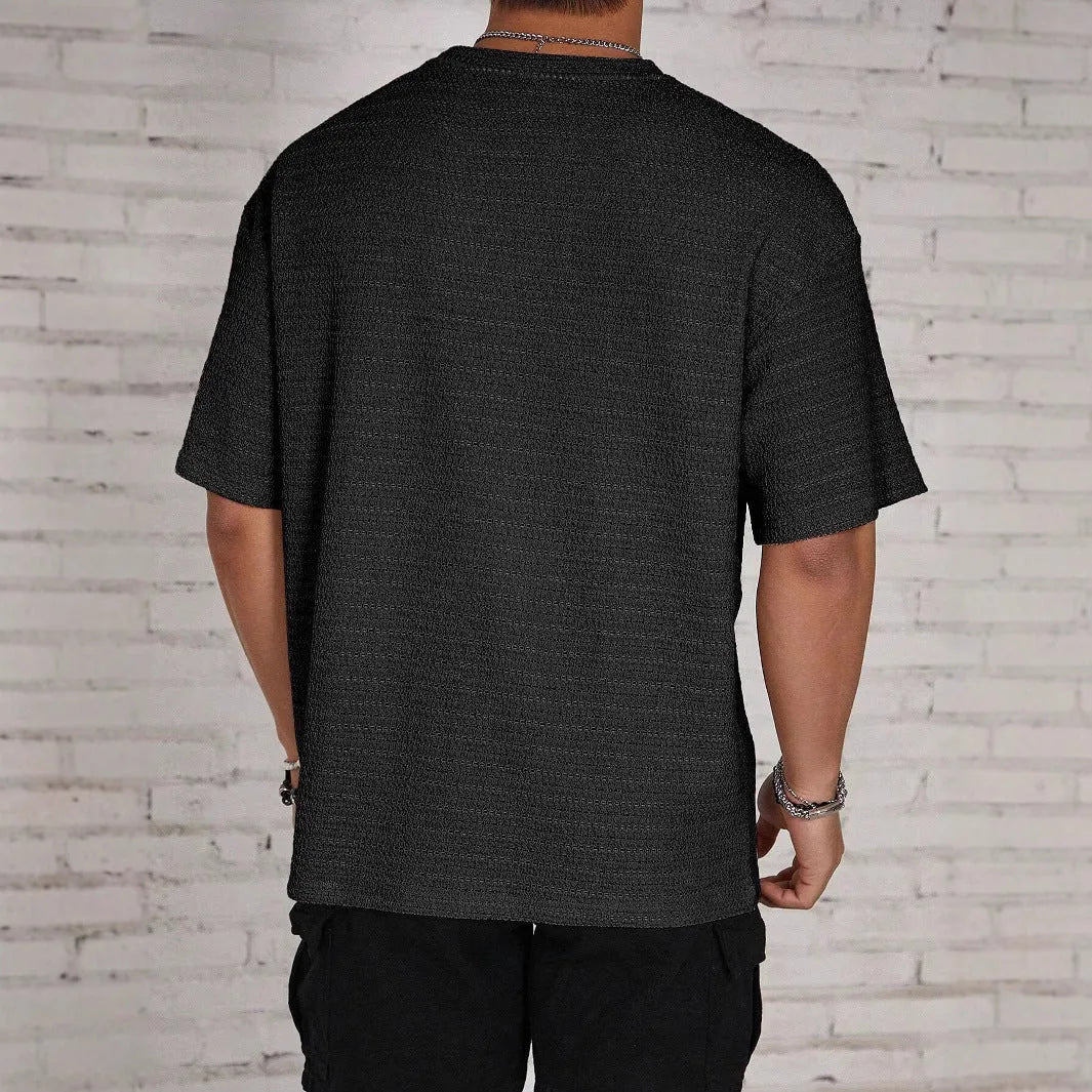 Men's slim fit polyester t-shirt in solid colours with round neck and short sleeves