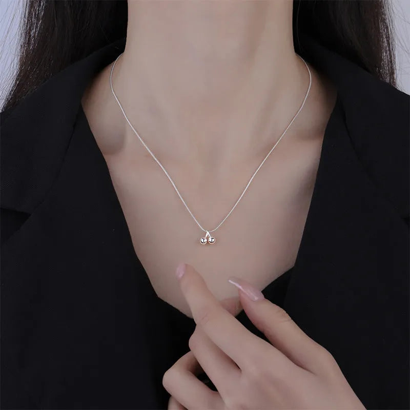 Silver cherry necklace on adjustable snake bone chain with S925 silver construction