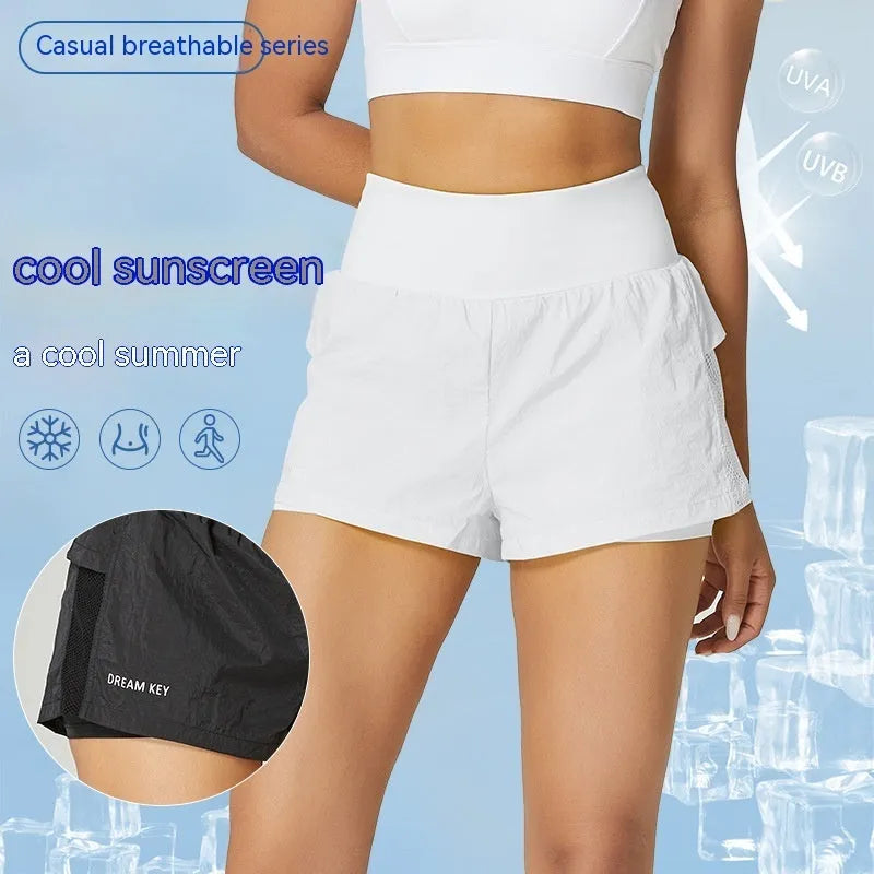 Women's loose casual quick-drying sports shorts in cotton blend fabric on a hanger.
