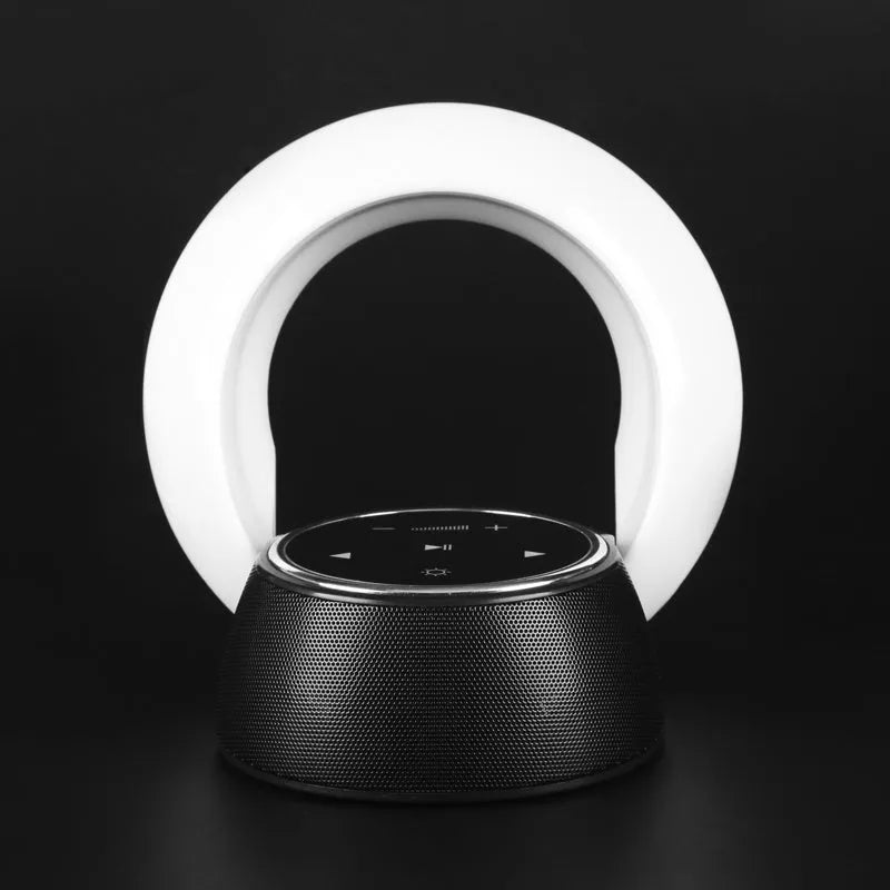 Blue Bluetooth desk lamp speaker with touch controls showing white, yellow, and blue lighting options