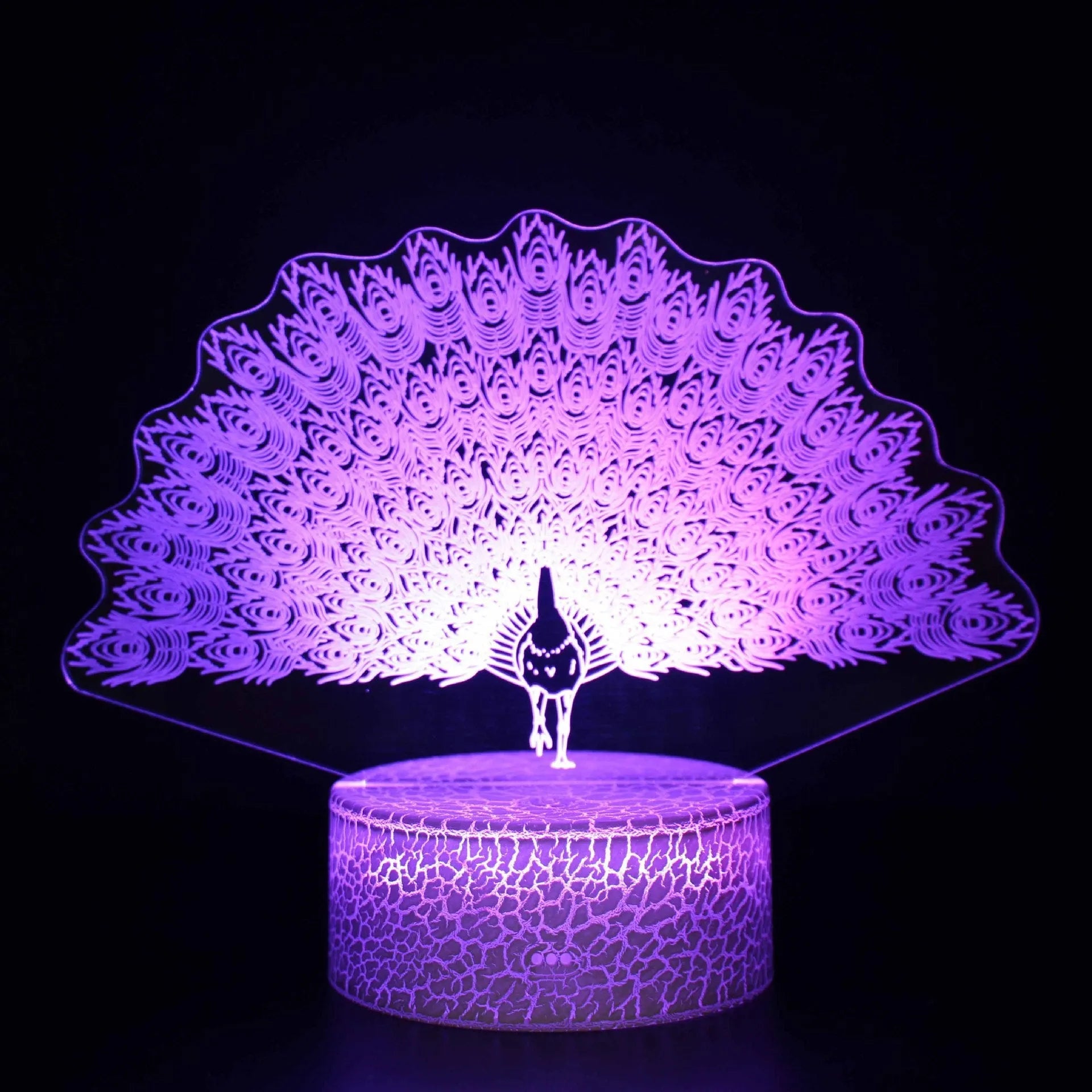 Colourful 3D acrylic USB table lamp with touch control on a wooden desk.