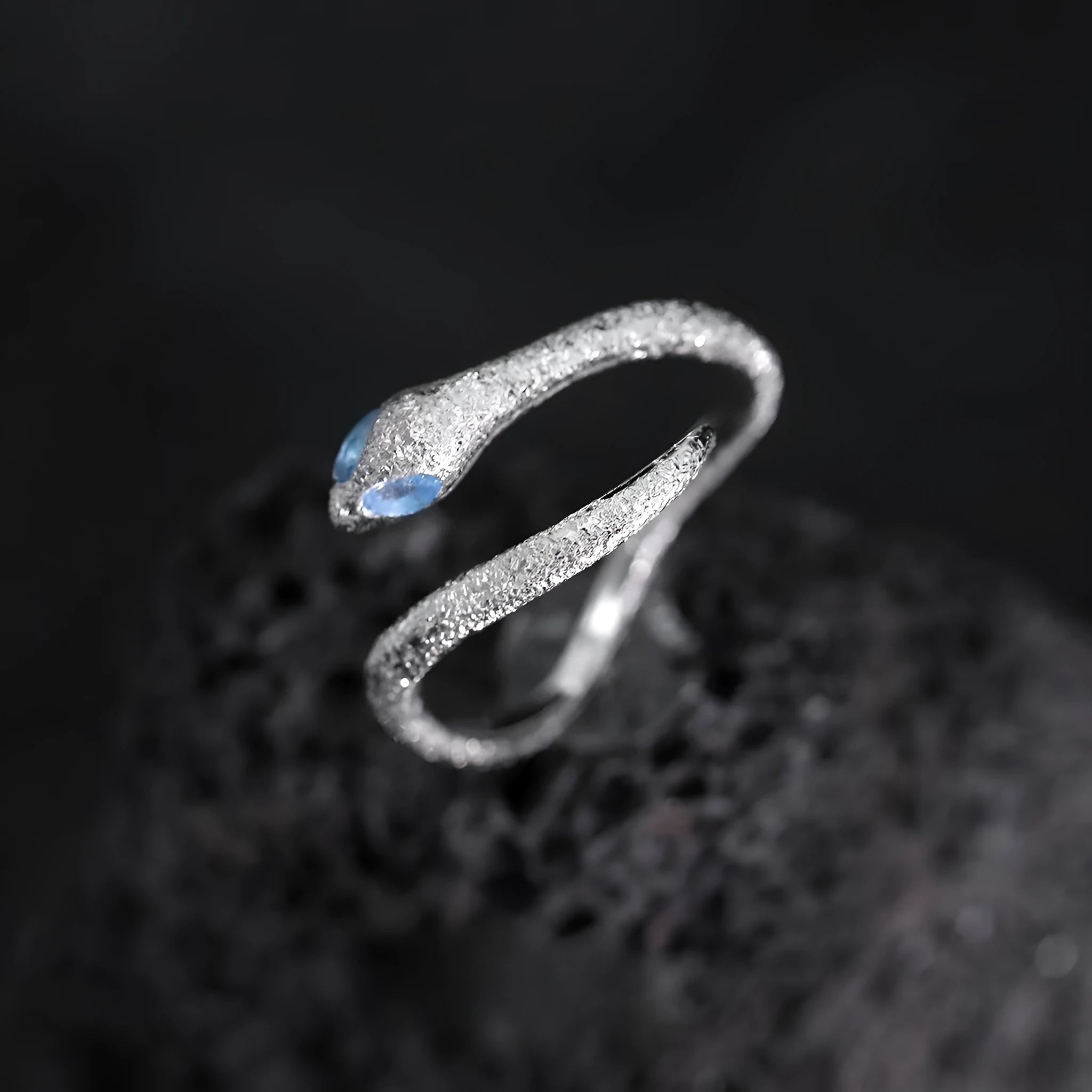 Silver snake design ring with adjustable opening and platinum colour electroplated finish