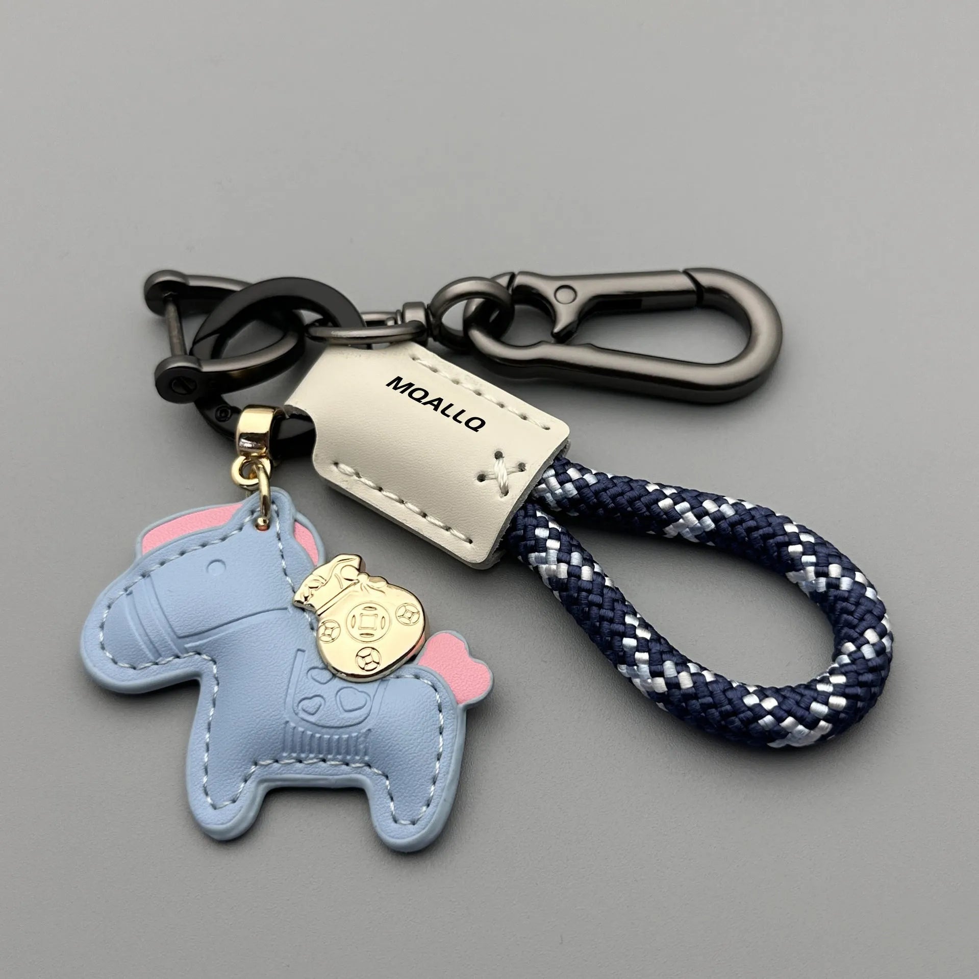 Handmade brown cowhide leather car key ring pendant with a zinc alloy belt buckle and green flanelle rope.