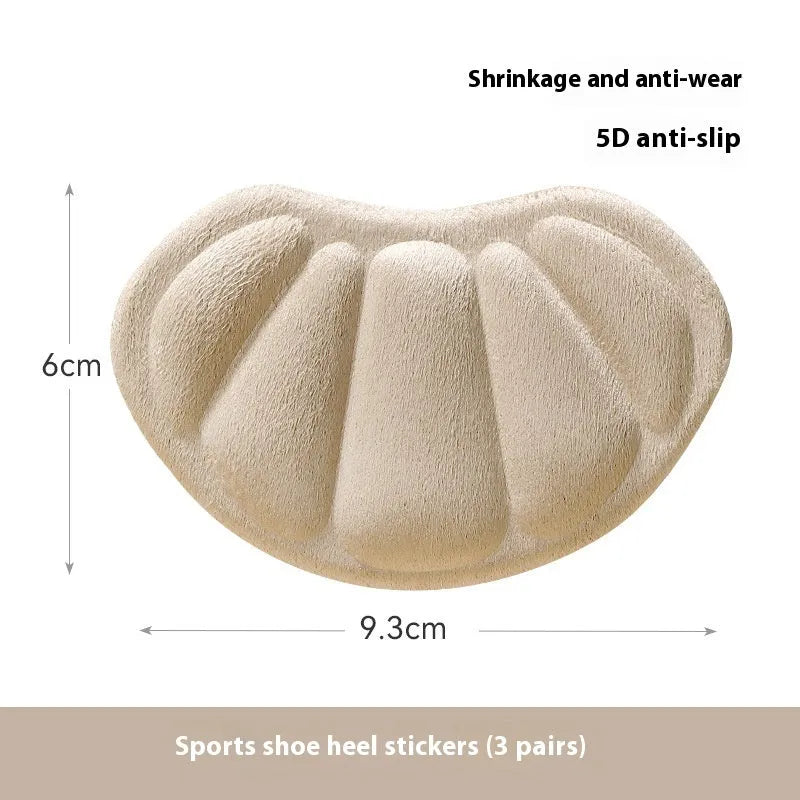 Camel-coloured suede anti-blister heel cushion pads with adhesive backing.