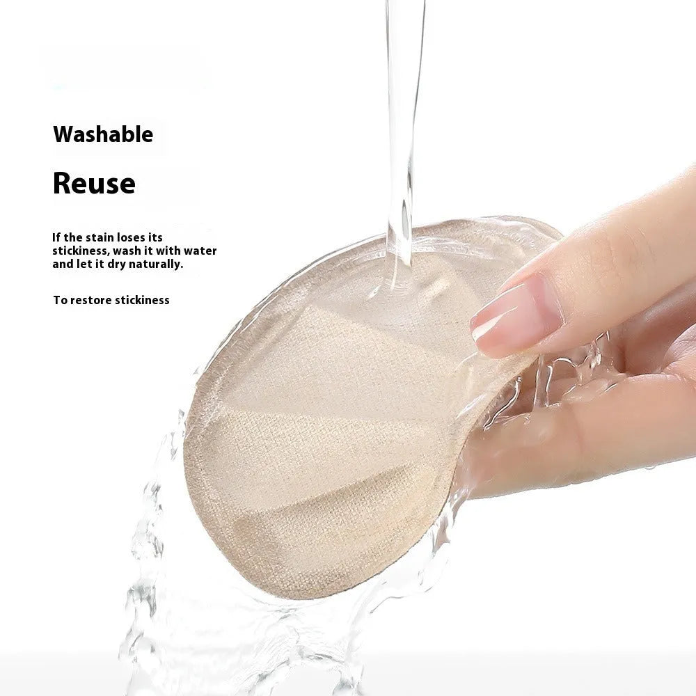 Camel-coloured suede anti-blister heel cushion pads with adhesive backing.