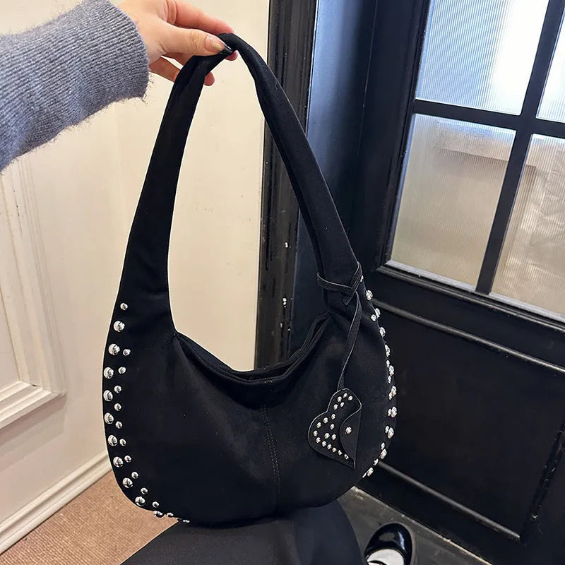 Women's soft plush tote handbag in retro styling with strapless underarm design