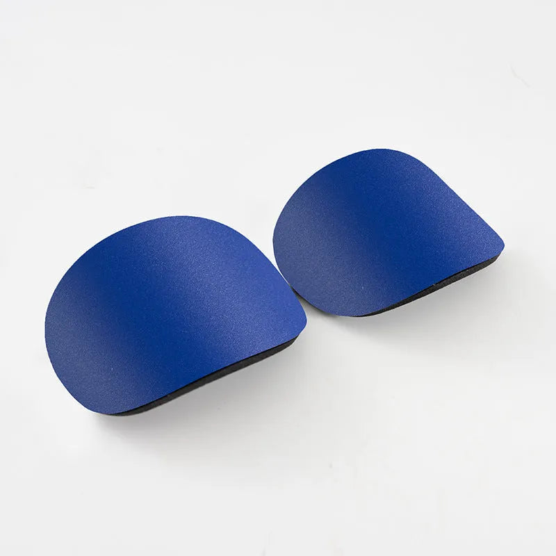 Pair of black PU mini shin guards for sports protection, showing S size.