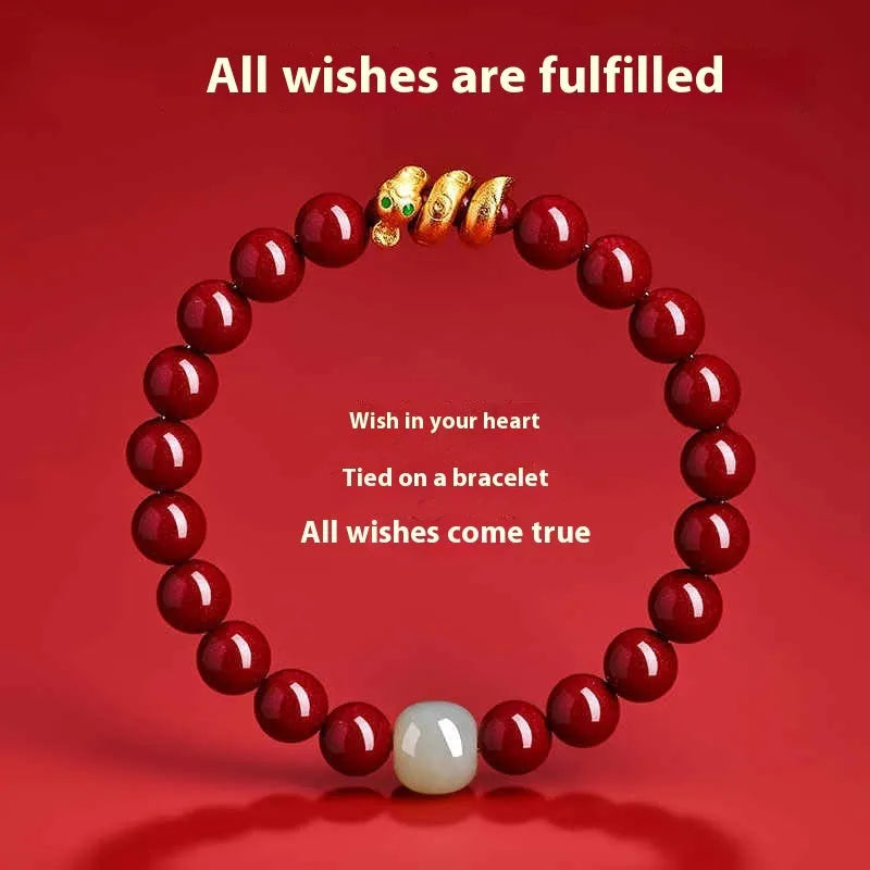 Handmade red cinnabar bracelet with snake Zodiac bead on a wrist, showing 8mm bead size.