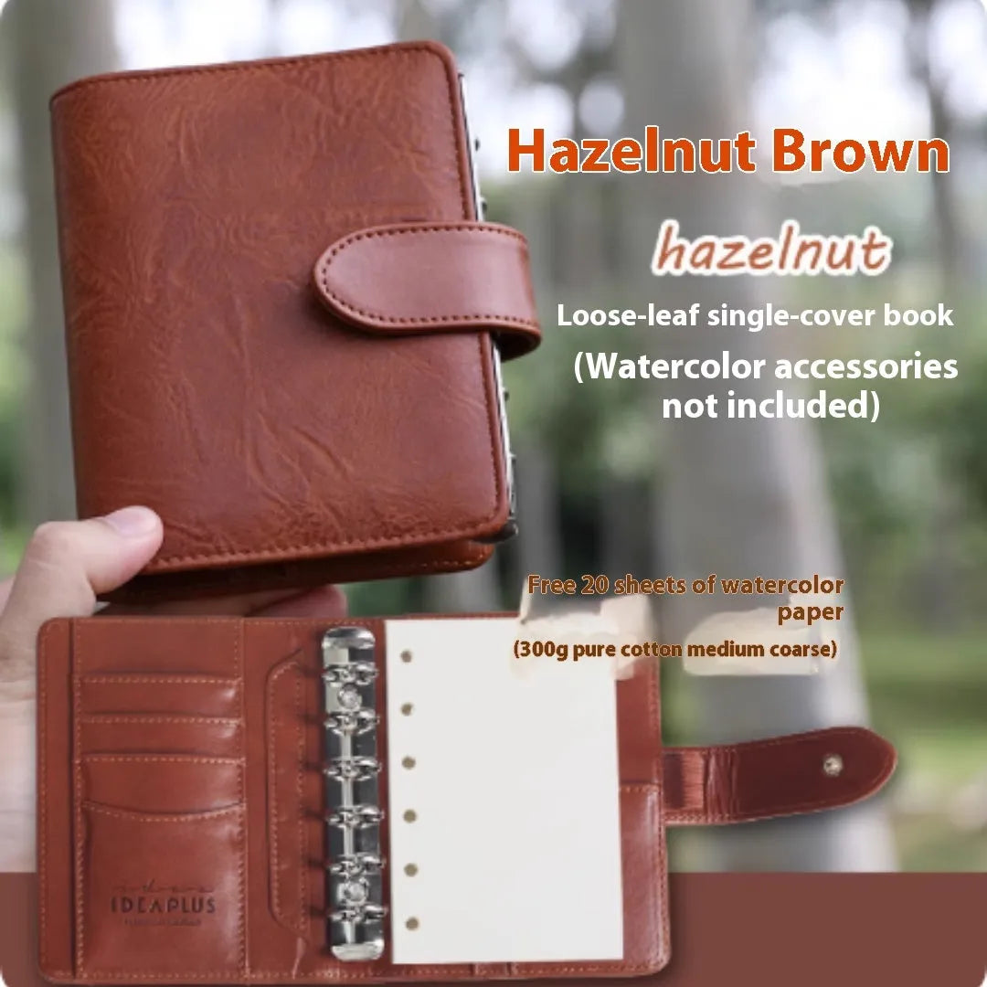 A7 loose-leaf watercolour sketchbook shown in one of five colour options: green, brown, yellow, coffee, or dark green.