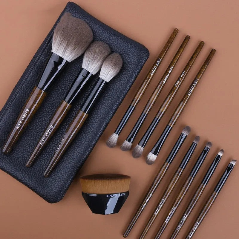 12 piece makeup brush set with wooden handles in a grey PU storage bag