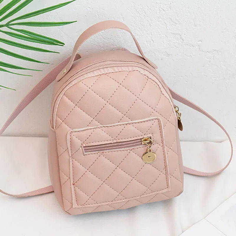 Hardback square Korean style embroidered girls' backpack in pink with soft handle.