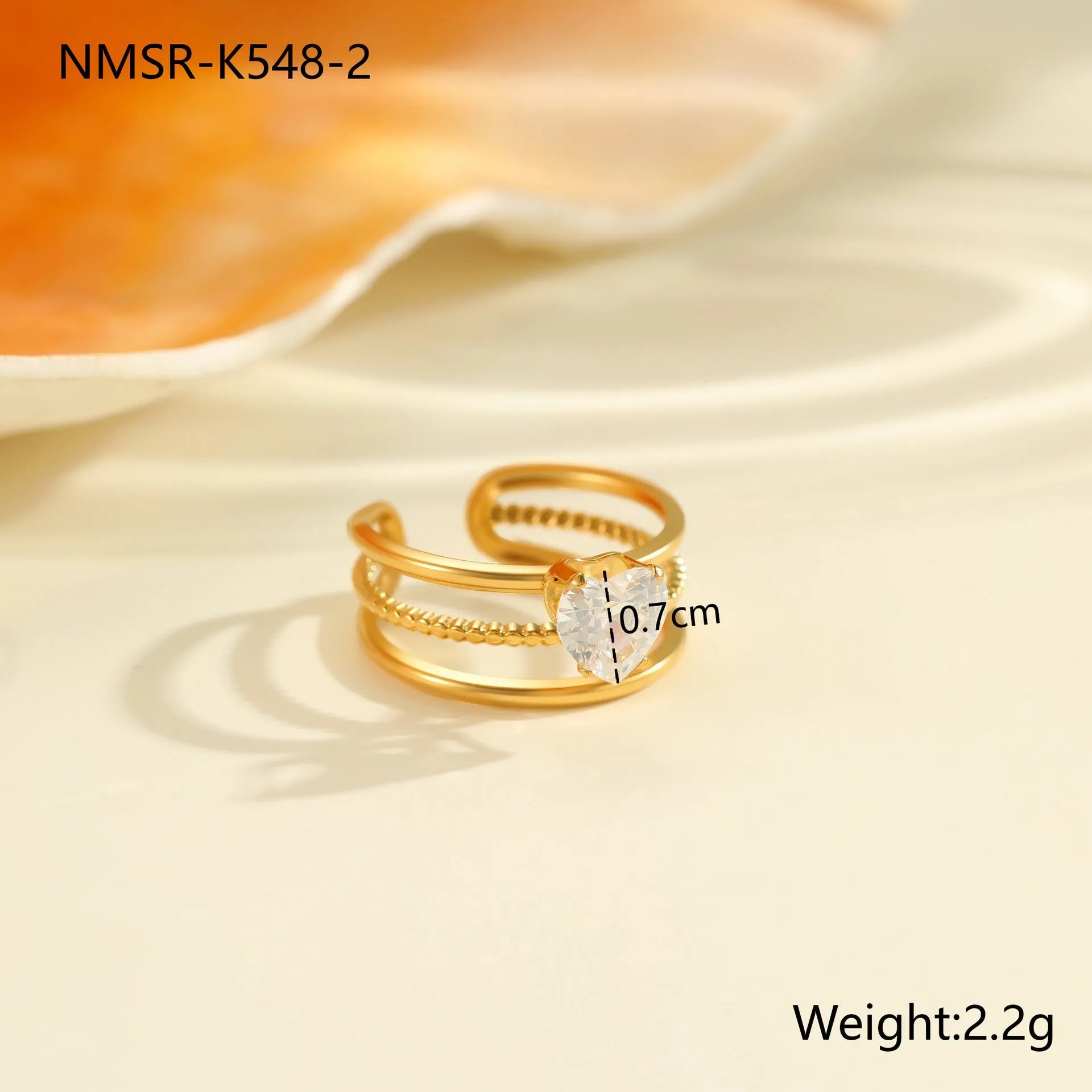 Gold electroplated stainless steel ring with zircon stones and open mouth adjustable design