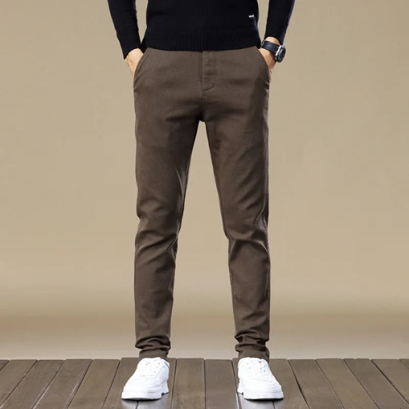 Men's fleece-lined slim fit tapered casual cotton trousers in black, shown flat for detail