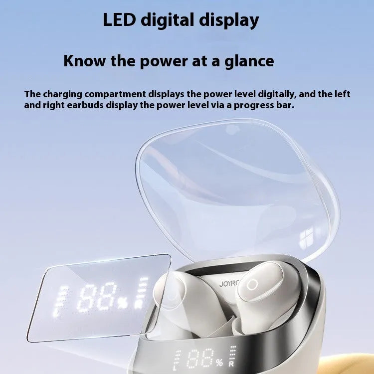 Wireless Bluetooth in-ear earbuds with a compact white charging case on a table.