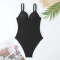 Women's black sunk-stripe one-piece swimsuit made from polyester fabric, sleeveless design.