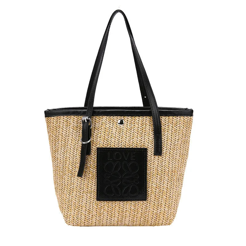 Straw woven women's shoulder bag in black with sewing thread detailing and large capacity design
