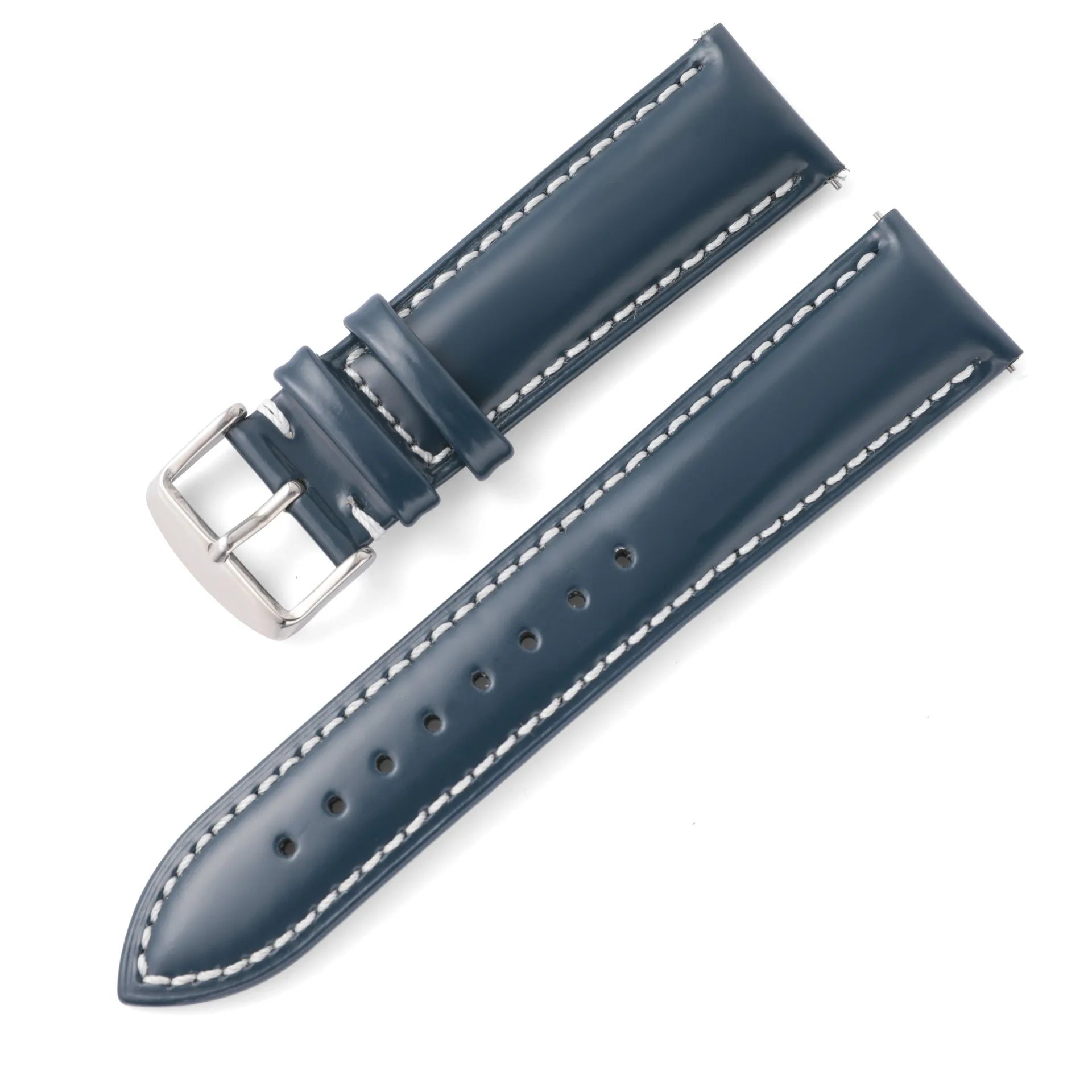 Quick release cowhide leather watch strap in black and white line colour on a watch.