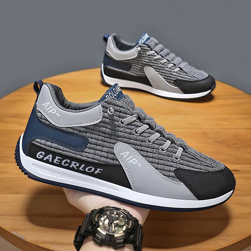 Men's green and grey lightweight mesh running shoes with lace-up front and round toe.