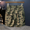 Men's camouflage cargo shorts in loose fit with cargo pockets and cotton blend fabric