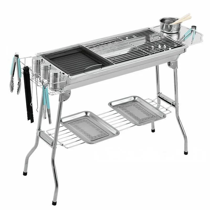 Large stainless steel portable barbecue oven with charcoal stove and cooking accessories