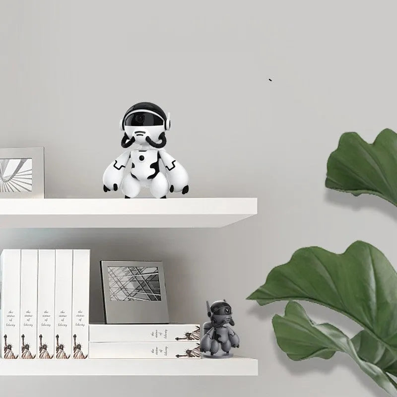 White indoor battery-powered security camera with wide-angle lens on a detachable base