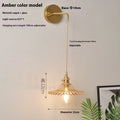 Brass lotus wall lamp with glass shade in six colour options