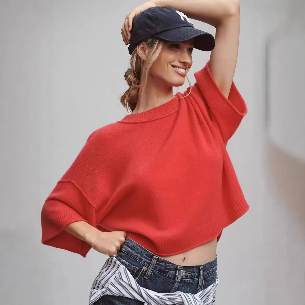 Women's red short T-shirt with exposed navel style made from viscose fibre.
