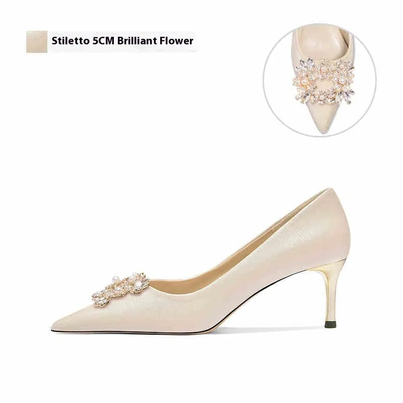 Women's pointed-toe high heel shoes with rhinestone decoration on cloth upper, showing stiletto and cat heel style options.