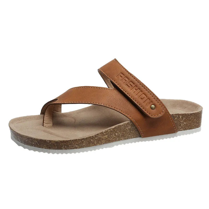 Flat toe ring thick-soled flip-flops in a solid colour on a light background