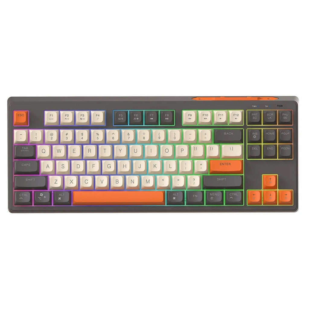 Free Wolf M87 wireless Bluetooth keyboard in blueberry colour on a desk with USB receiver and cable.