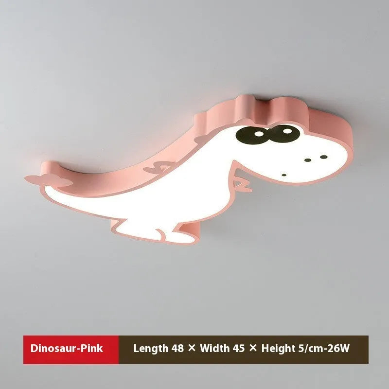 Green cartoon dinosaur ceiling light with dimmer switch on a white ceiling.