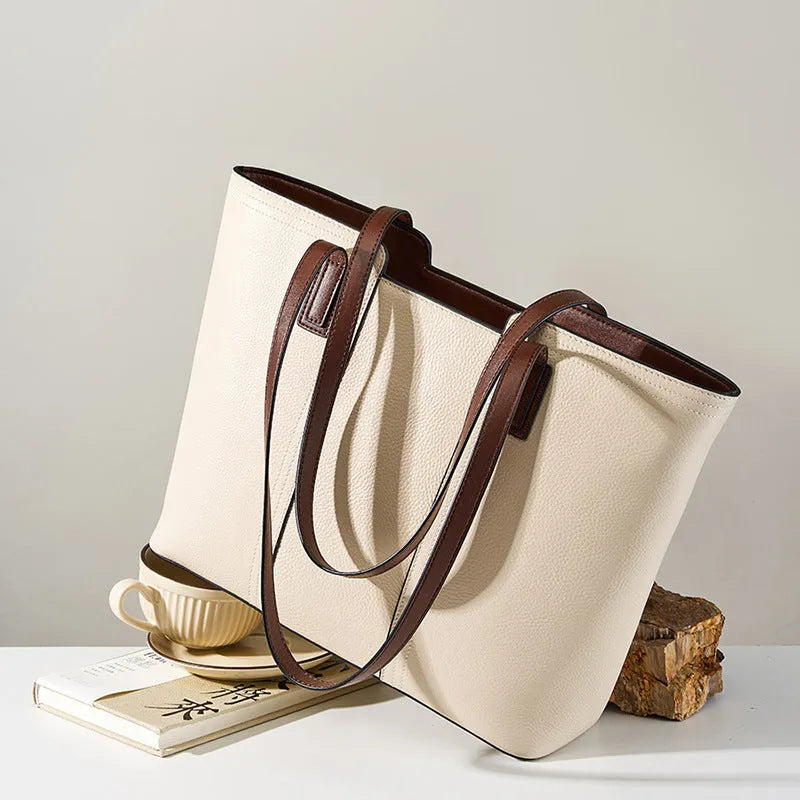 Genuine leather women's crossbody bag with multiple internal compartments in horizontal square design