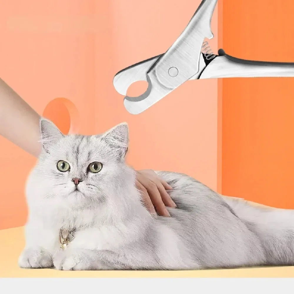 Silver pet nail clipper with stainless steel blades and safety guard for trimming dog and cat claws