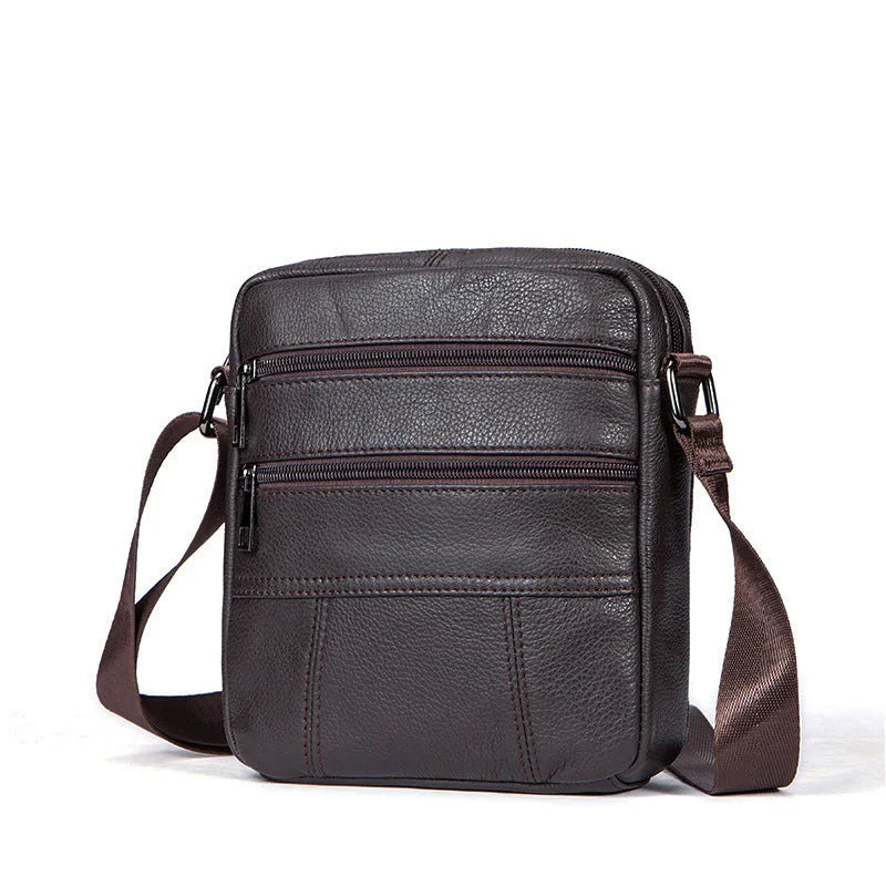 Men's vintage brown genuine cowhide leather vertical square shoulder bag with a zipper.