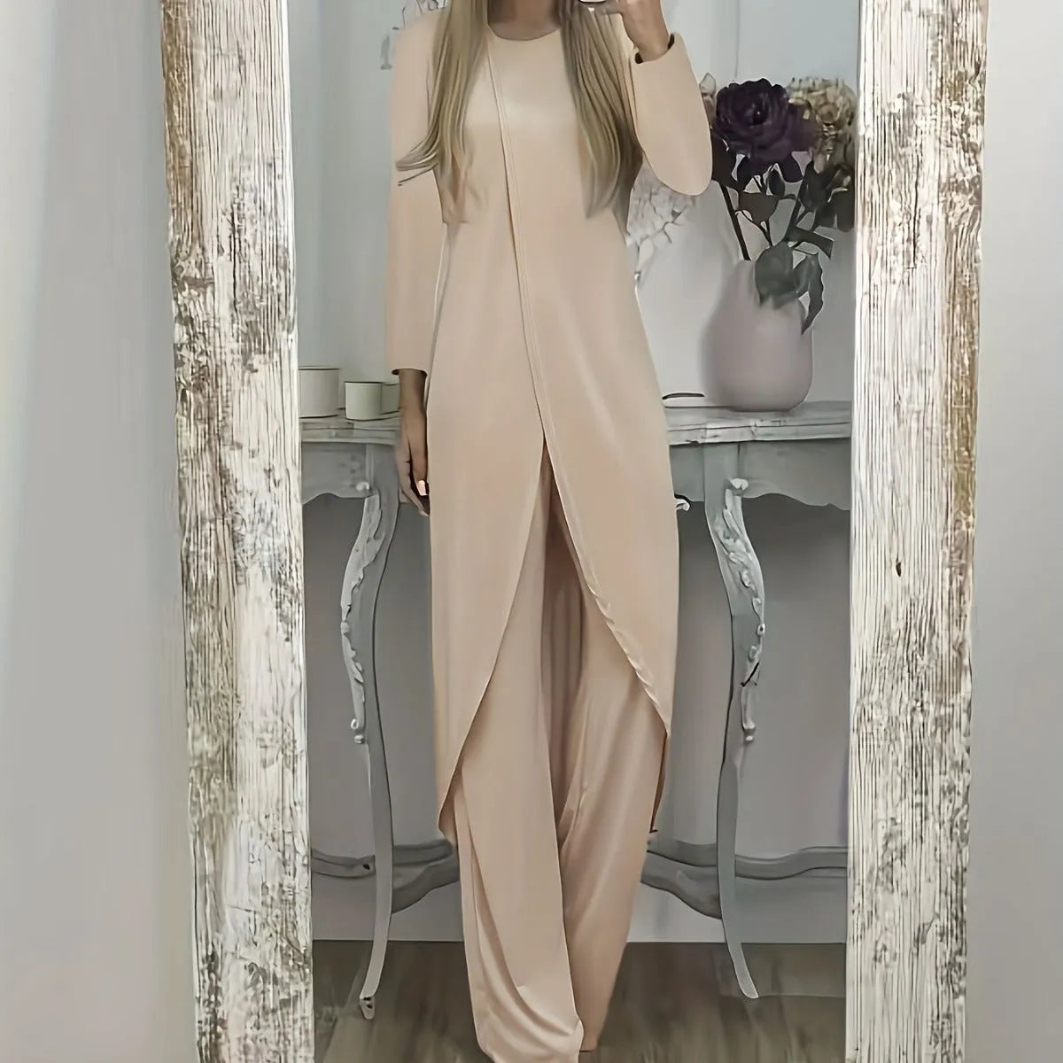 A loose-fitting long sleeve two-piece lounge set in polyester, shown in black, blue, and khaki colour options.